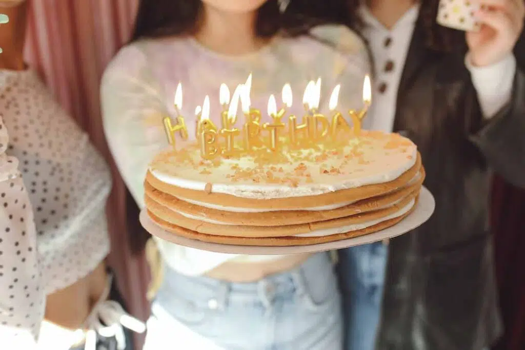 Close Up Shot of a Person Holding a Birthday Cake - Free birthday cake images