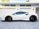 White-Ferrari-luxury-car-images-near-parking-area