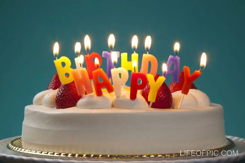 Happy birthday cake with colorful candles - Free birthday cake images