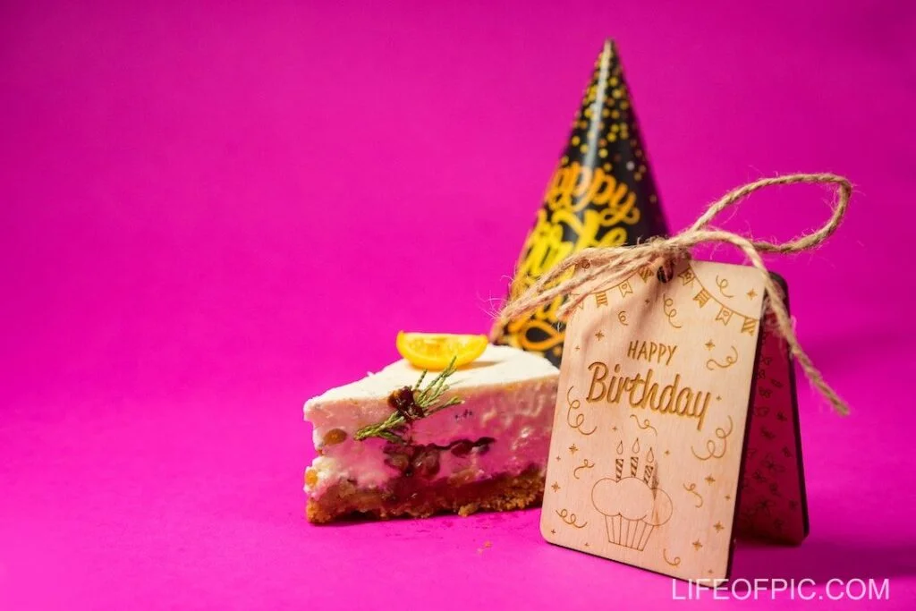 A Slice of Birthday Cake on Pink Surface - Free birthday cake images