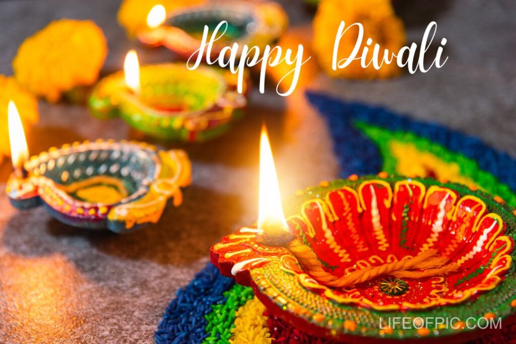 Diya or oil lamp with flowers on concrete background