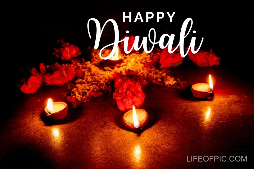 Diya with flowers on concrete background
