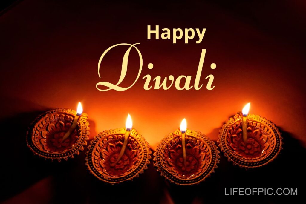 Four beautiful clay diya or oil lamps glowing during Diwali festival indian traditional festival Deepavali