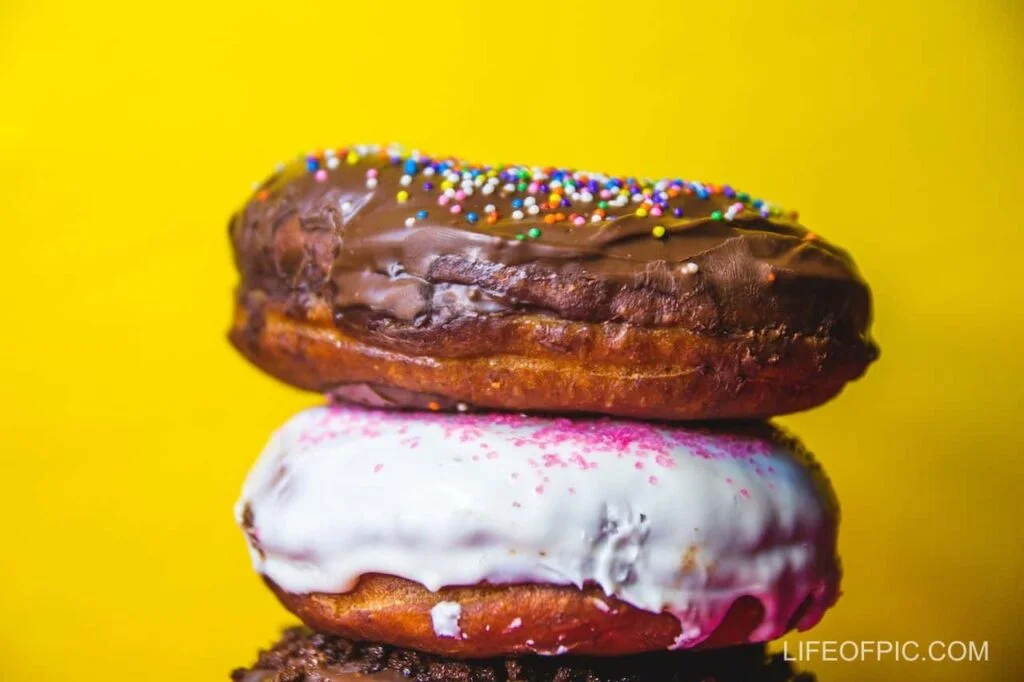 Close Up Shot of Stack of Doughnuts - Donuts Images