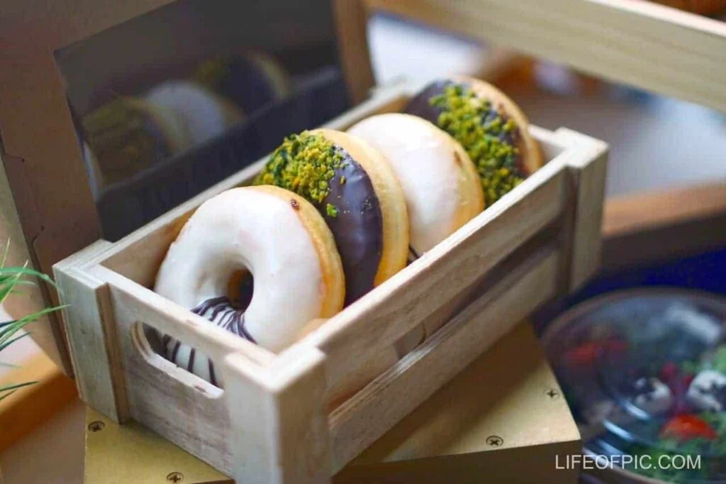 Doughnuts in a Wooden Container - Donuts Images