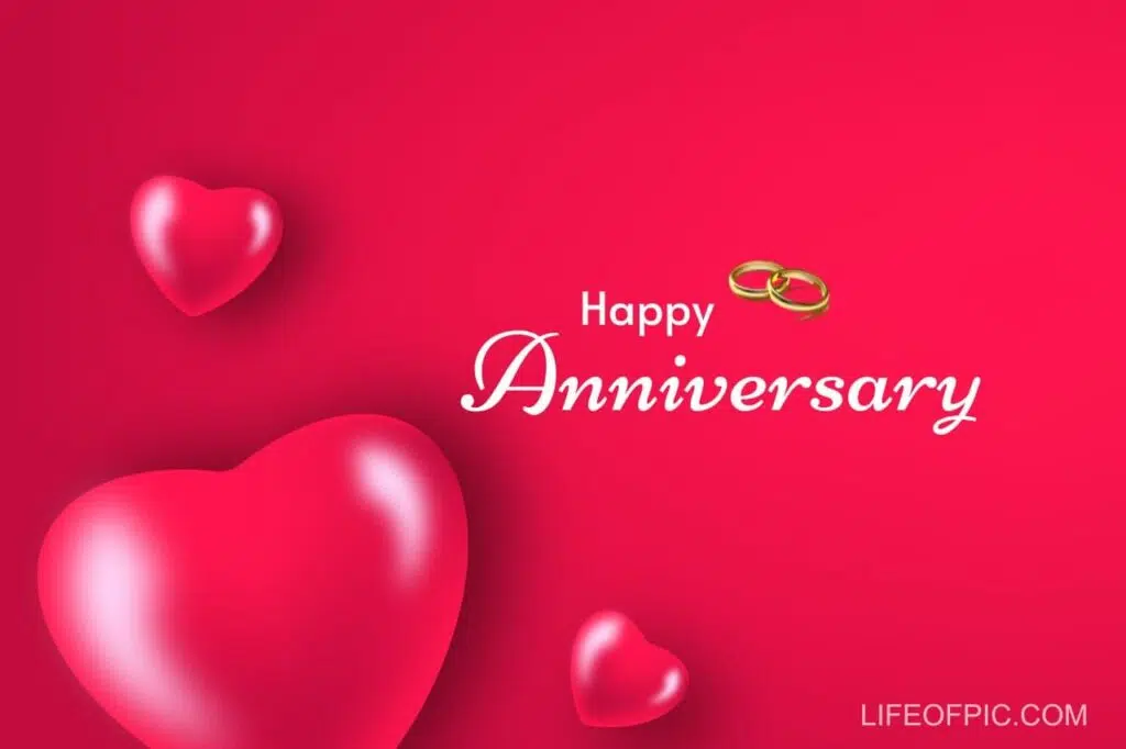 A red heart with gold rings - happy anniversary images