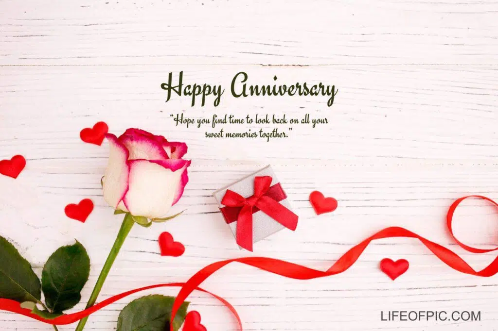 A rose and a gift box - happy anniversary images